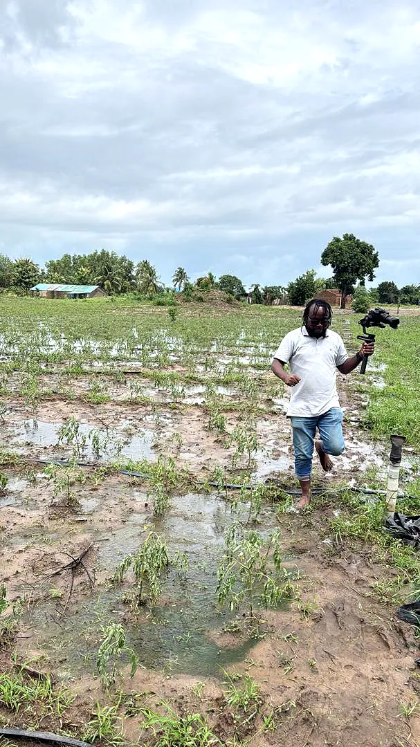 Filming in a waterlogged vegetable plot during Agro Champion