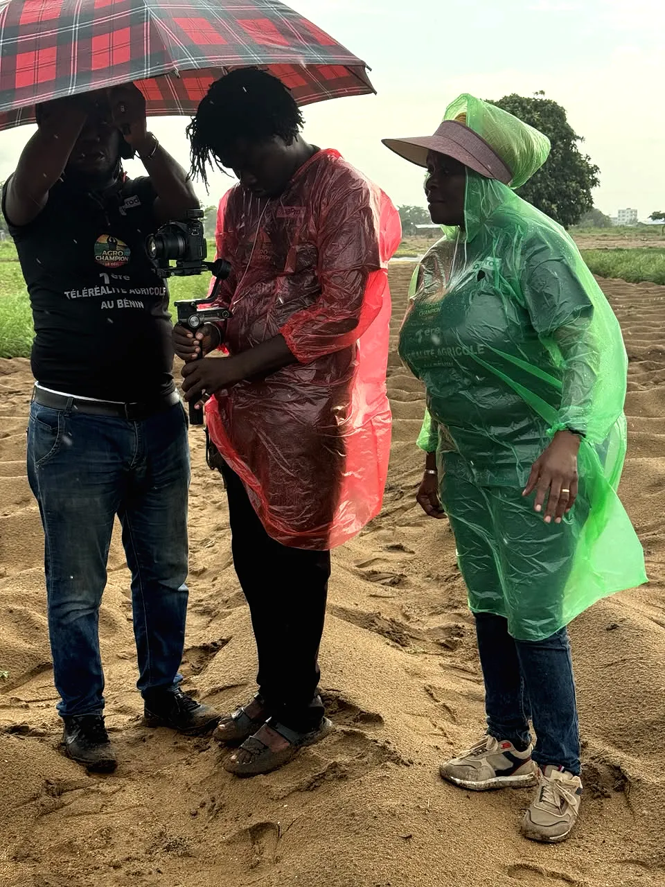 Checking footage in the rain, Agro Champion report in Benin